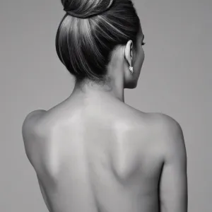 Jennifer Lopez nude, hair in a bun, , seen from the back