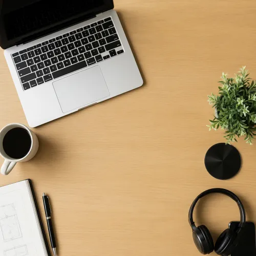 Create a clean top-down flat lay of a creative workspace